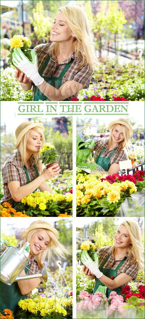       / Girl in the garden - stock photo